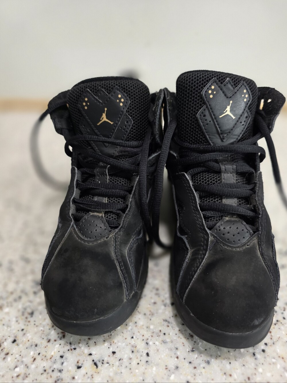 Air Jordan True Flight in the Black/Metallic Gold/White Kids Size 13C